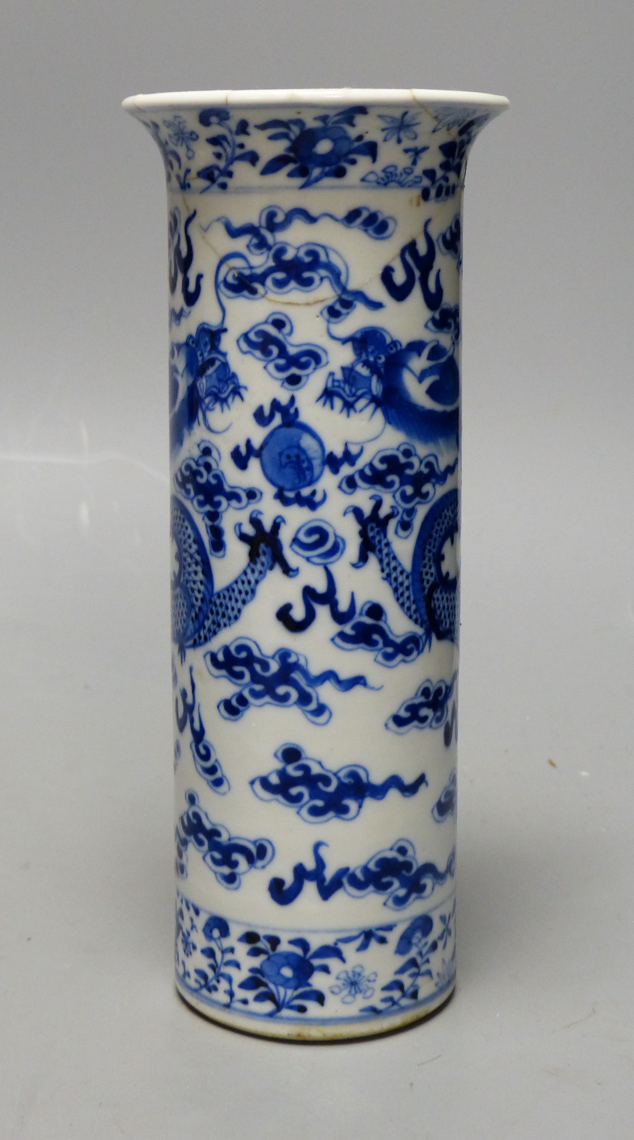 A large Japanese Imari bowl, Meiji period, diameter 31cm, and a Chinese blue and white sleeve vase